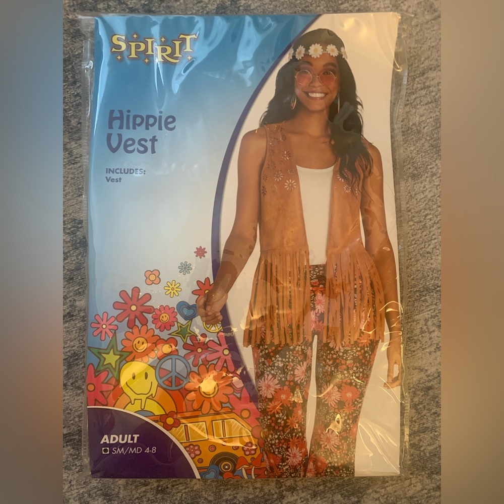 Halloween costume:  Adult Hippie Vest w/ tie dye shirt and accessories